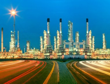 Beautiful lighting of oil refinery plant in  heav petrochemicaly clipart