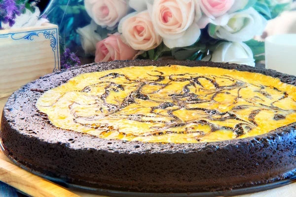 Close up full big pound of brownie cheese cake on wood plate dec — Stock Photo, Image