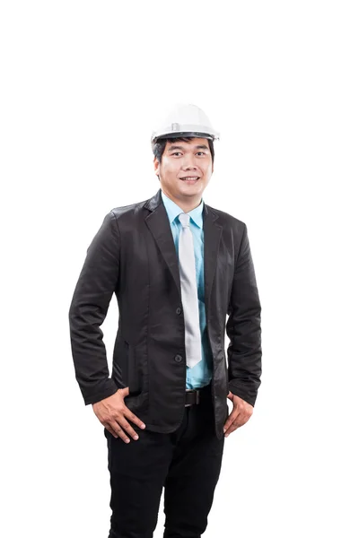 Ingegnere indossando casco di sicurezza bianco in piedi e sorridente — Foto Stock