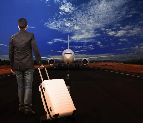 Young man and luggage on airport runways — Stock Photo, Image