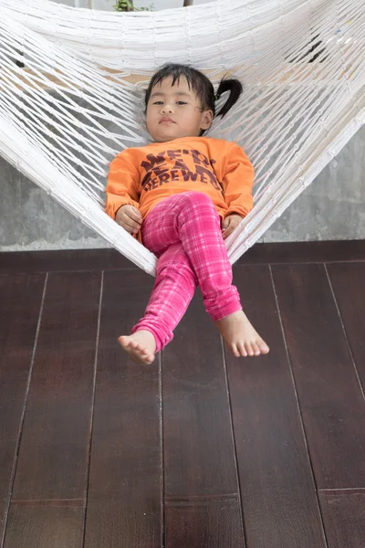 Portrait of children realxing in cradle — Stock Photo, Image