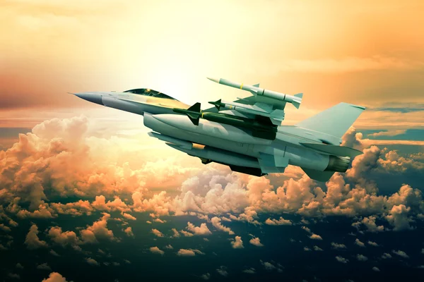 Military jet plane with missile weapon flying against sunset sky — Stock Photo, Image