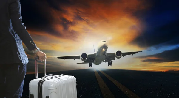 Young business man and luggage suitcase standing with passenger — Stock Photo, Image