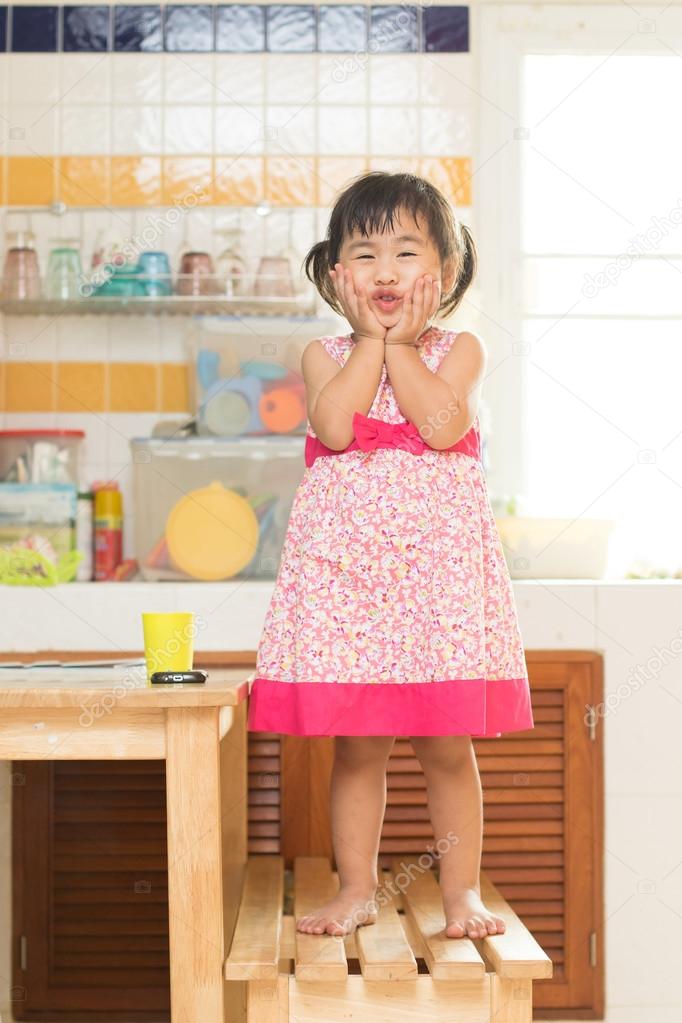 lovely acting of little children dinning table in home kitchen r