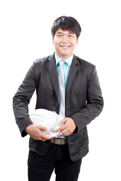 Young asian engineering man standing and holding safety helmet i — Stock Photo, Image