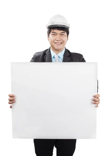 Engineering man wearing white safety helmet holding empty banner — Stock Photo, Image