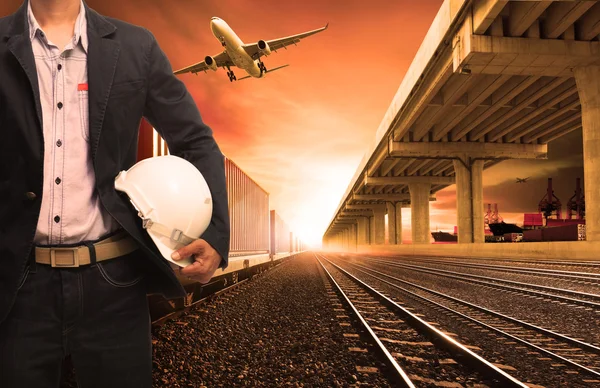 Industry container trains on railways track cargo plane flying w — Stock Photo, Image