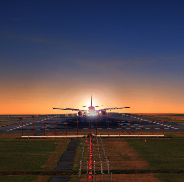 passenger jet plane approaching on airport runways preparing to 