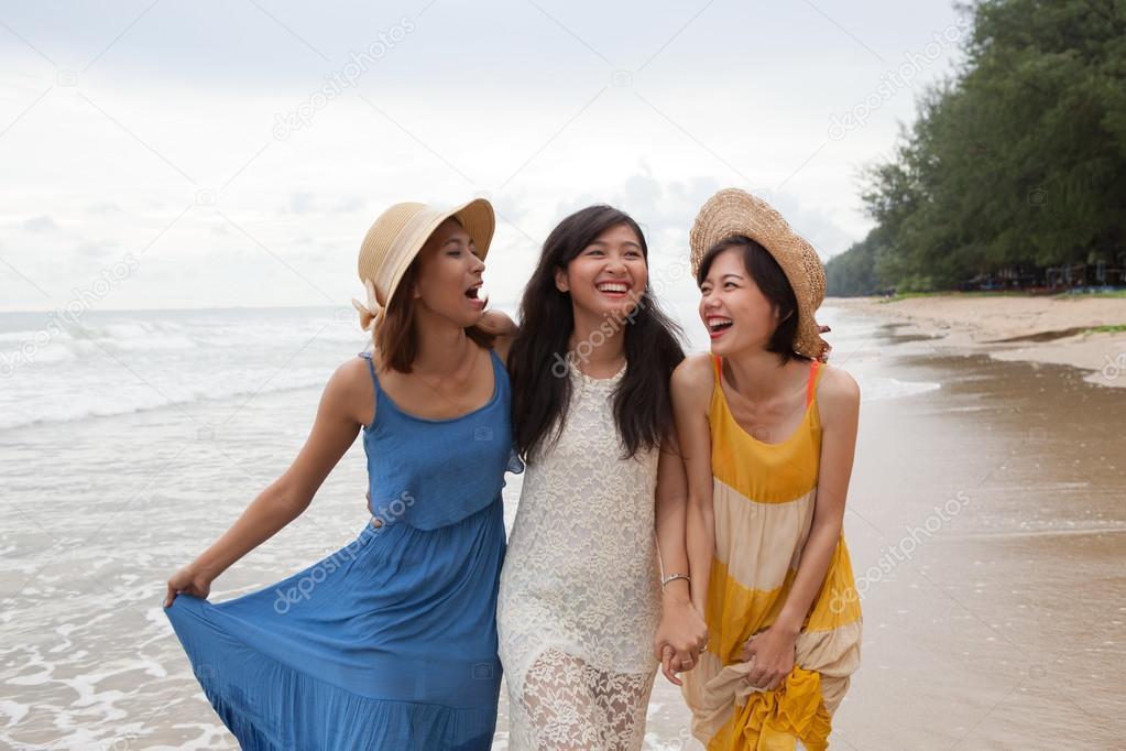 portrait of young asian woman with happiness emotion wearing bea