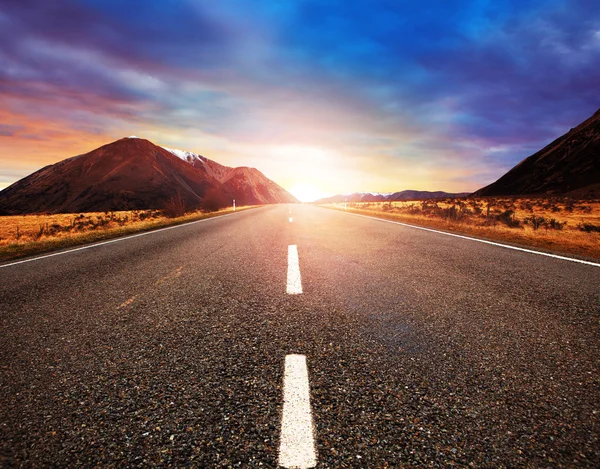 Beautiful sun rising sky with asphalt highways road in rural sce — Stock Photo, Image