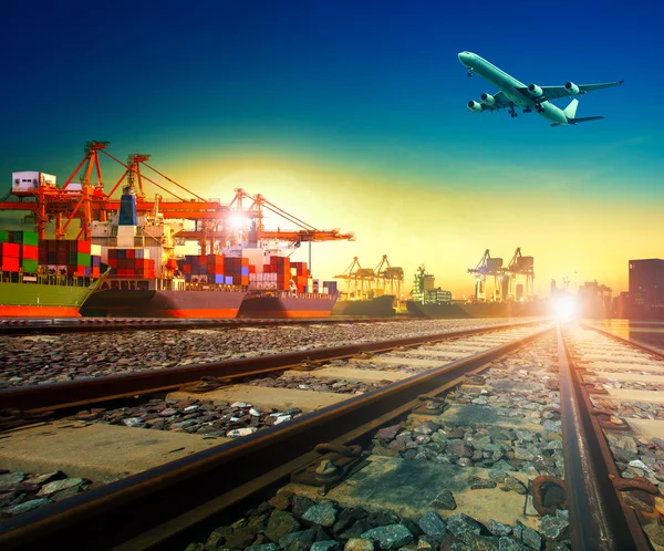 Railway transport in import export shipping port and cargo plane — Stock Photo, Image