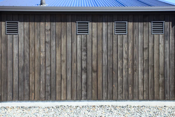 Bel arrangement de maison de ferme mur en bois — Photo