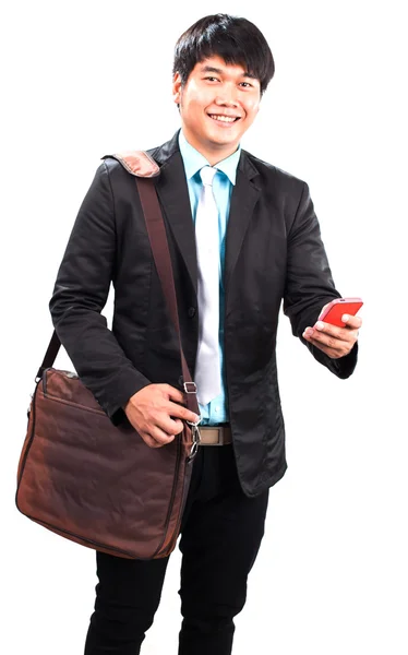 Joven hombre de negocios y computadora portátil traje bolso y manejar papel —  Fotos de Stock