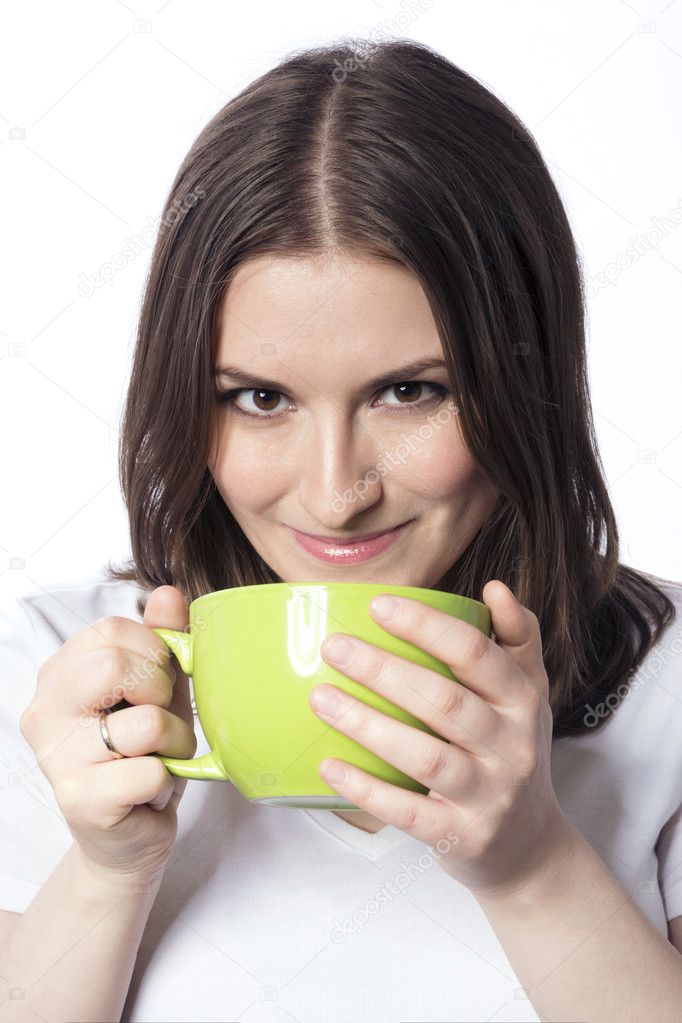 young woman with a green cup