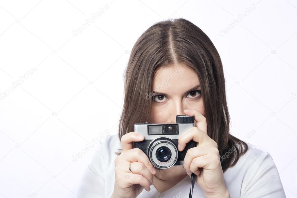 young woman with a camera