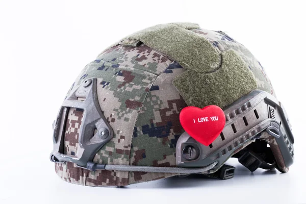 Helmet and little heart — Stock Photo, Image