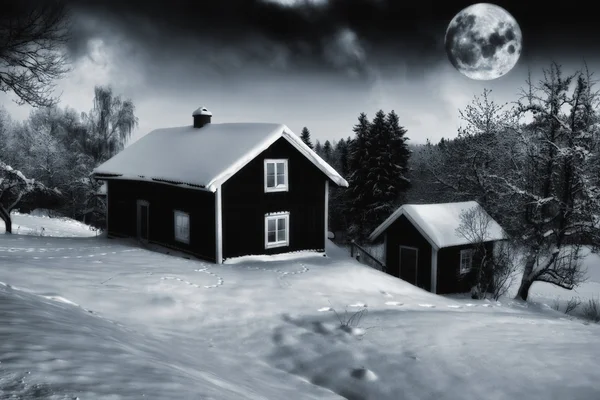 Oude huisjes in een rustige winterlandschap — Stockfoto
