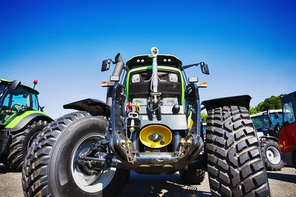 Large farming tractor with giant tires — Stock Photo, Image