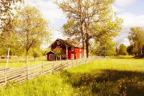 Old farm house in a rural old landscape — Stock Photo, Image