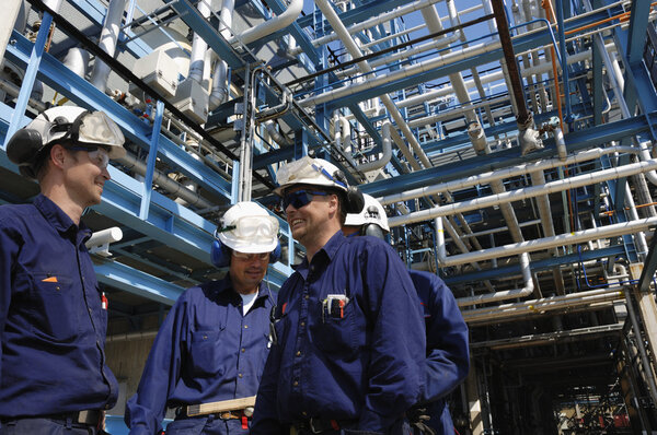 oil and gas workers inside pipelines constructions