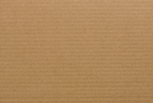 Brown paper corrugated sheet board surface — Stock Photo, Image