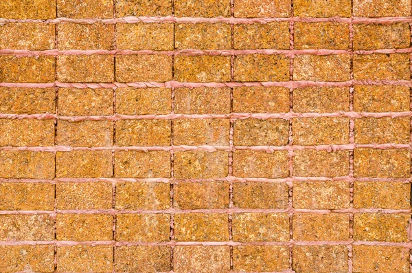 Modello di superficie del muro di pietra di laterite — Foto Stock