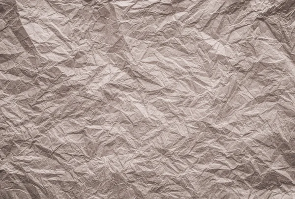 Hintergrund und Struktur von braunem zerknittertem Papier — Stockfoto
