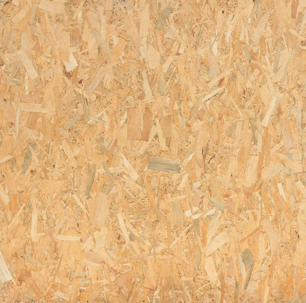 Pressed wooden panel background, seamless texture of oriented st — Stock Photo, Image