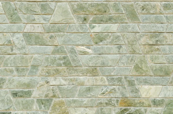 Візерунок зеленого шиферу кам'яна поверхня стіни — стокове фото