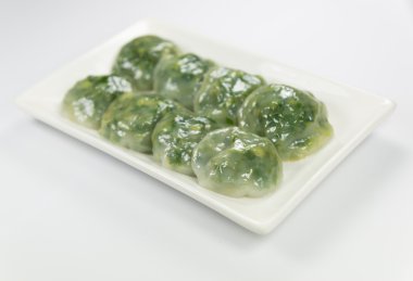 Buharda pişmiş hamur tatlısı sarımsak Chives ve Taro ve bambu ile doldurulmuş 