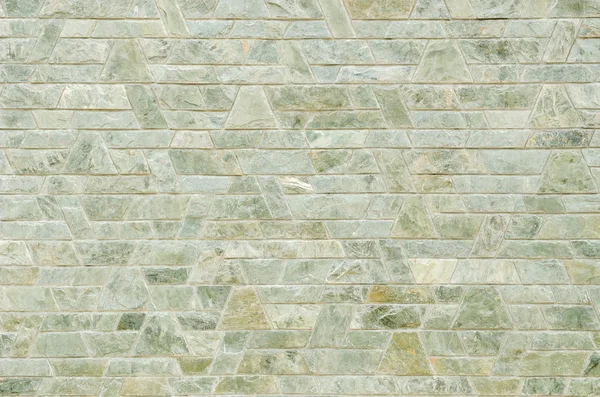 緑のスレートの石の壁の表面のパターン — ストック写真