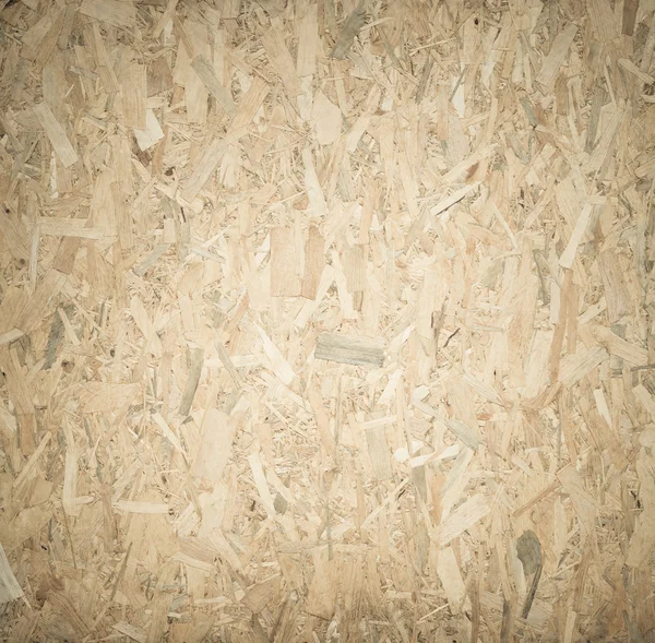 Pressed wooden panel background, seamless texture of oriented st — Stock Photo, Image