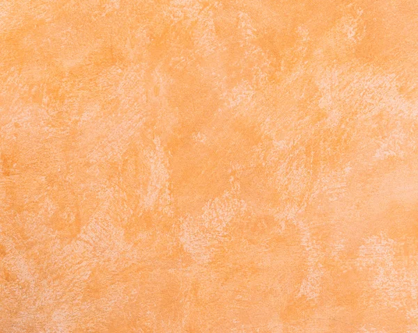 Konkreta textur dekorativ yta på orange väggfärg — Stockfoto