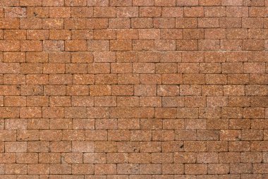 Kırmızı dekoratif laterite taş duvar yüzeyi