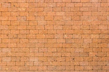 Kırmızı dekoratif laterite taş duvar yüzeyi