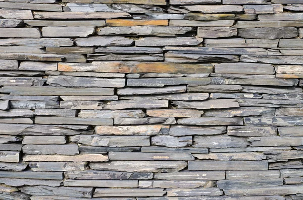 Pattern of decorative slate stone wall — Stock Photo, Image