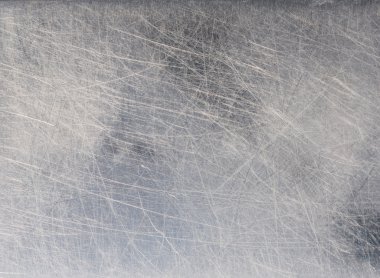 Paslanmaz çelik arka plan üzerinde çizikler