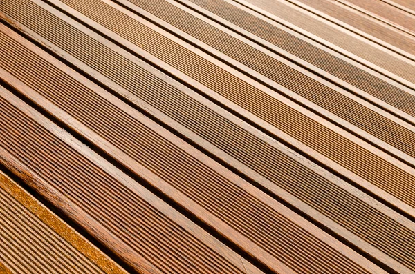 装飾的な表面の床に木製の縞模様 — ストック写真