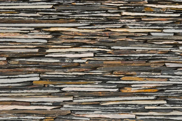 Patroon van leisteen stenen muur — Stockfoto