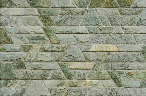 รูปแบบของพื้นผิวผนังหินชนวนสีเขียว — ภาพถ่ายสต็อก
