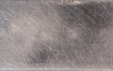 Paslanmaz çelik arka plan üzerinde çizikler