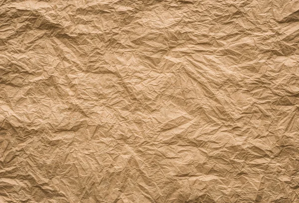 Achtergrond en de textuur van bruin Wrinkled papier — Stockfoto