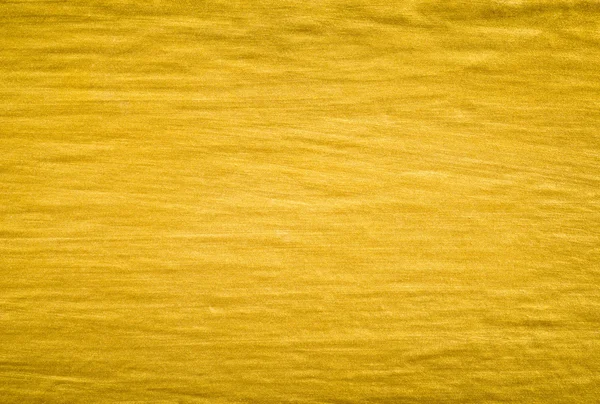 Золотой цвет краски на стене — стоковое фото