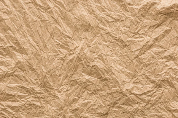 Fondo y textura de papel arrugado marrón — Foto de Stock