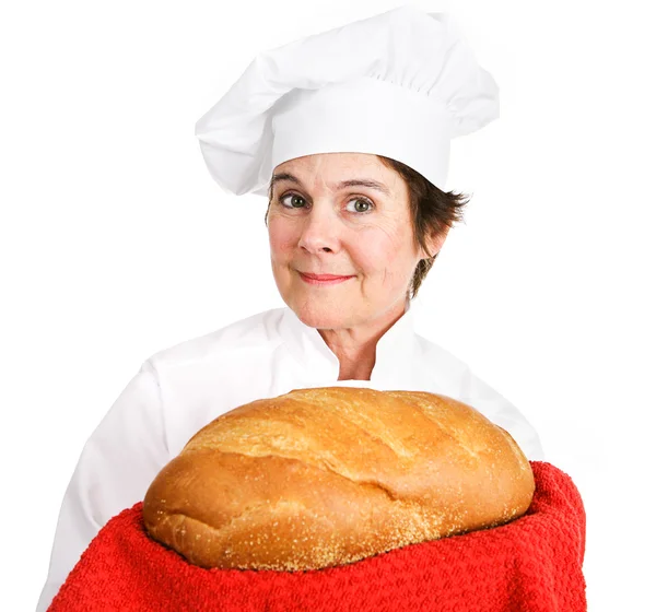 Szakács friss kenyérrel — Stock Fotó