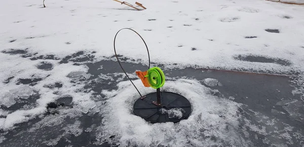 ice fishing in cold weather