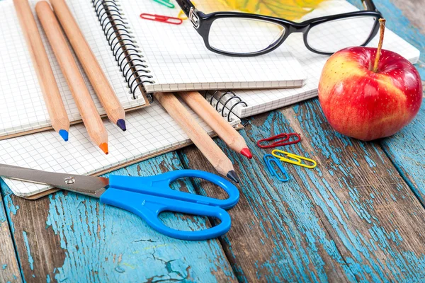 Office or school supplies on wooden planks. — Stock Photo, Image