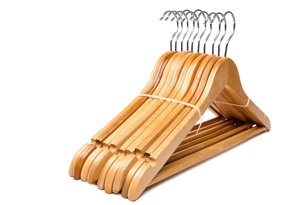 Perchas de madera para ropa en blanco . —  Fotos de Stock