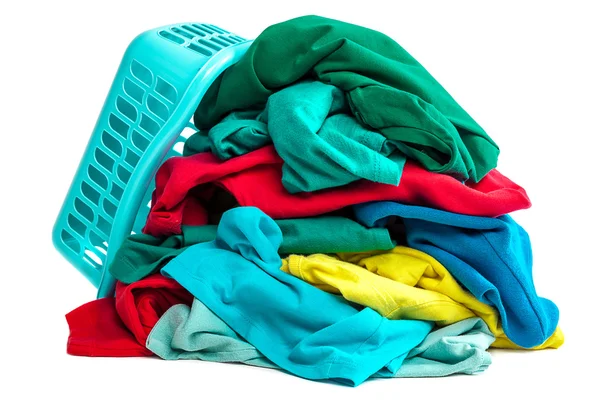 Clothes to wash and a plastic container. — Stock Photo, Image