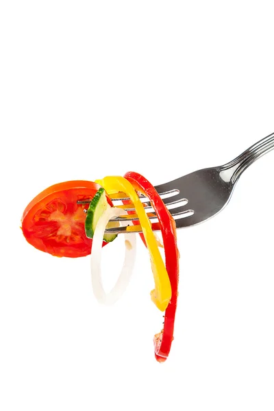 Sliced vegetables on a metal fork — Stock Photo, Image